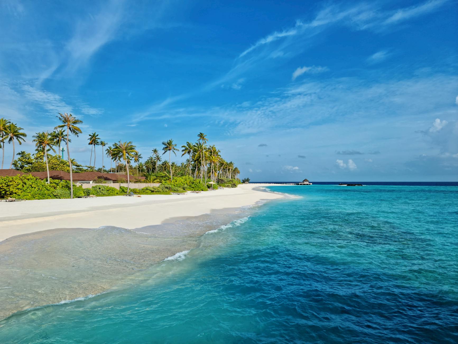 picturesque beach view in maldives with clear blue waters