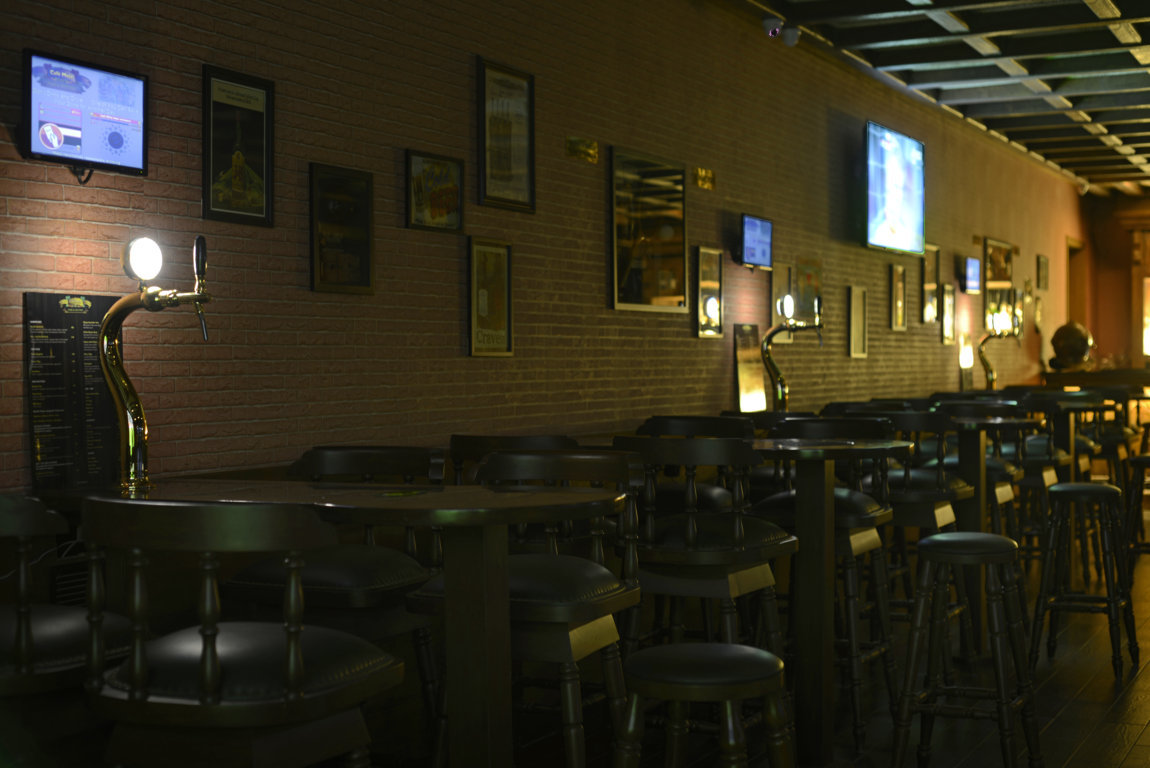 Beer on tap at each table -Cafe Mojo