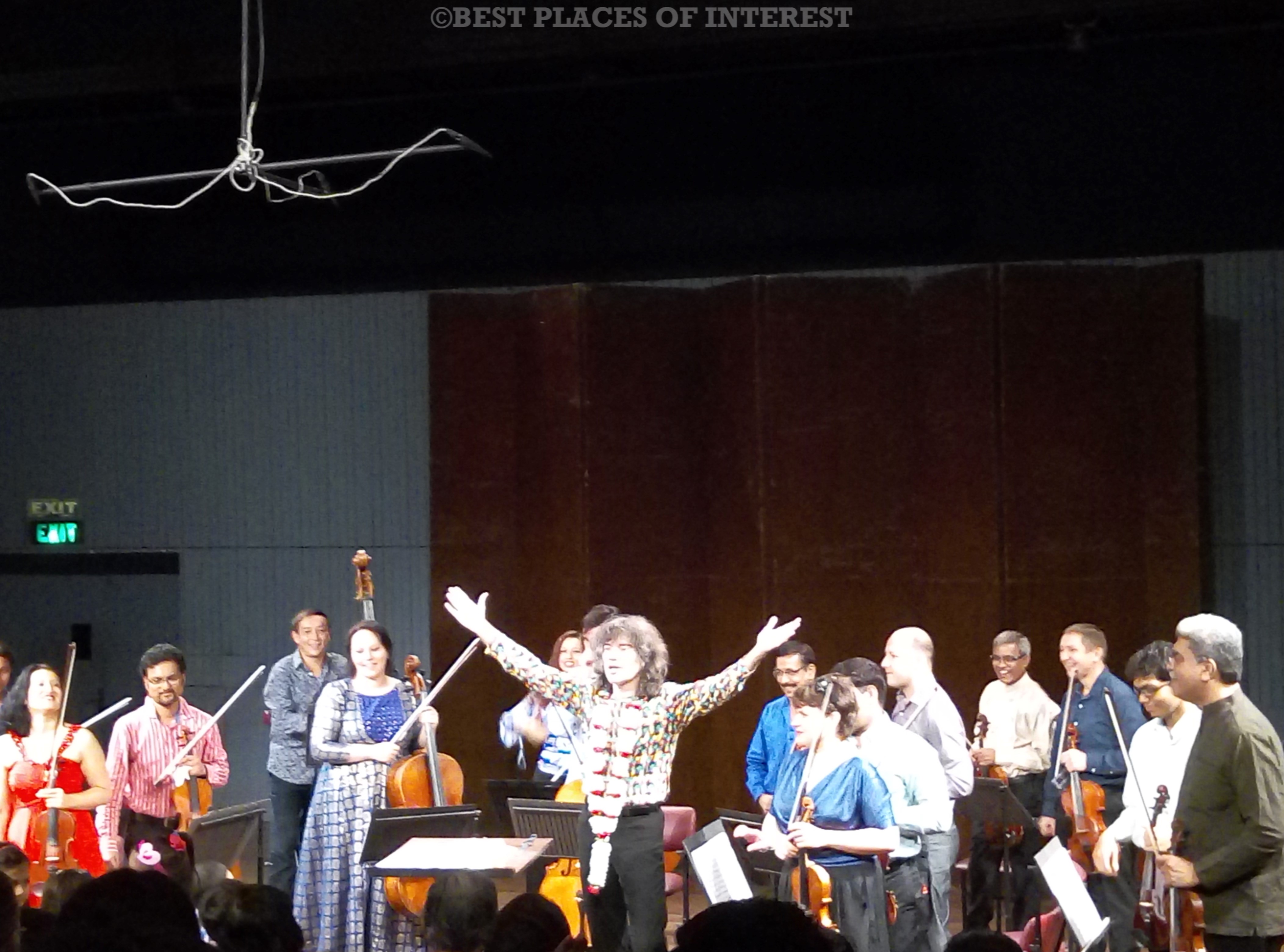 Conductor with his orchestra at Ncpa