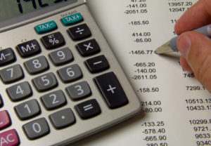 Balancing the account my hand-dream vacation budget