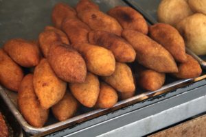 A tray of en:alcapurrias, street food Puerto Rico