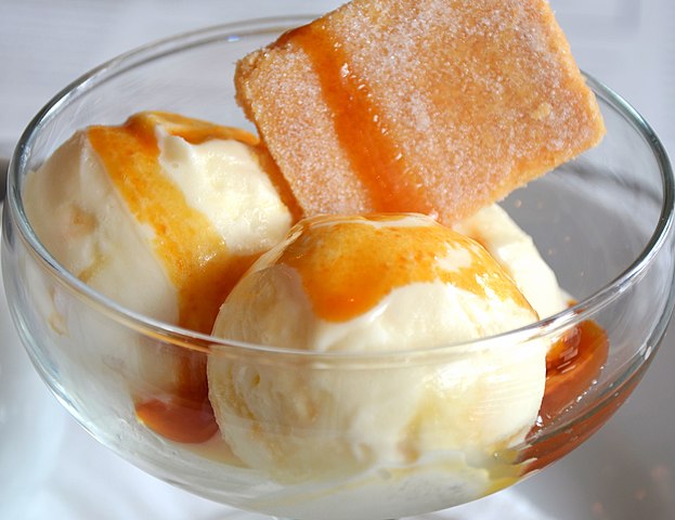 Honeycomb ice cream with honeycomb toffee and hot toffee sauce.