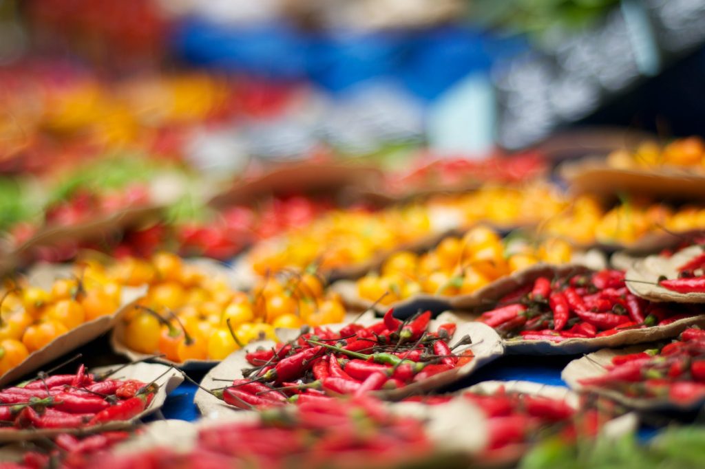 selective focus photography of bunch of chilies