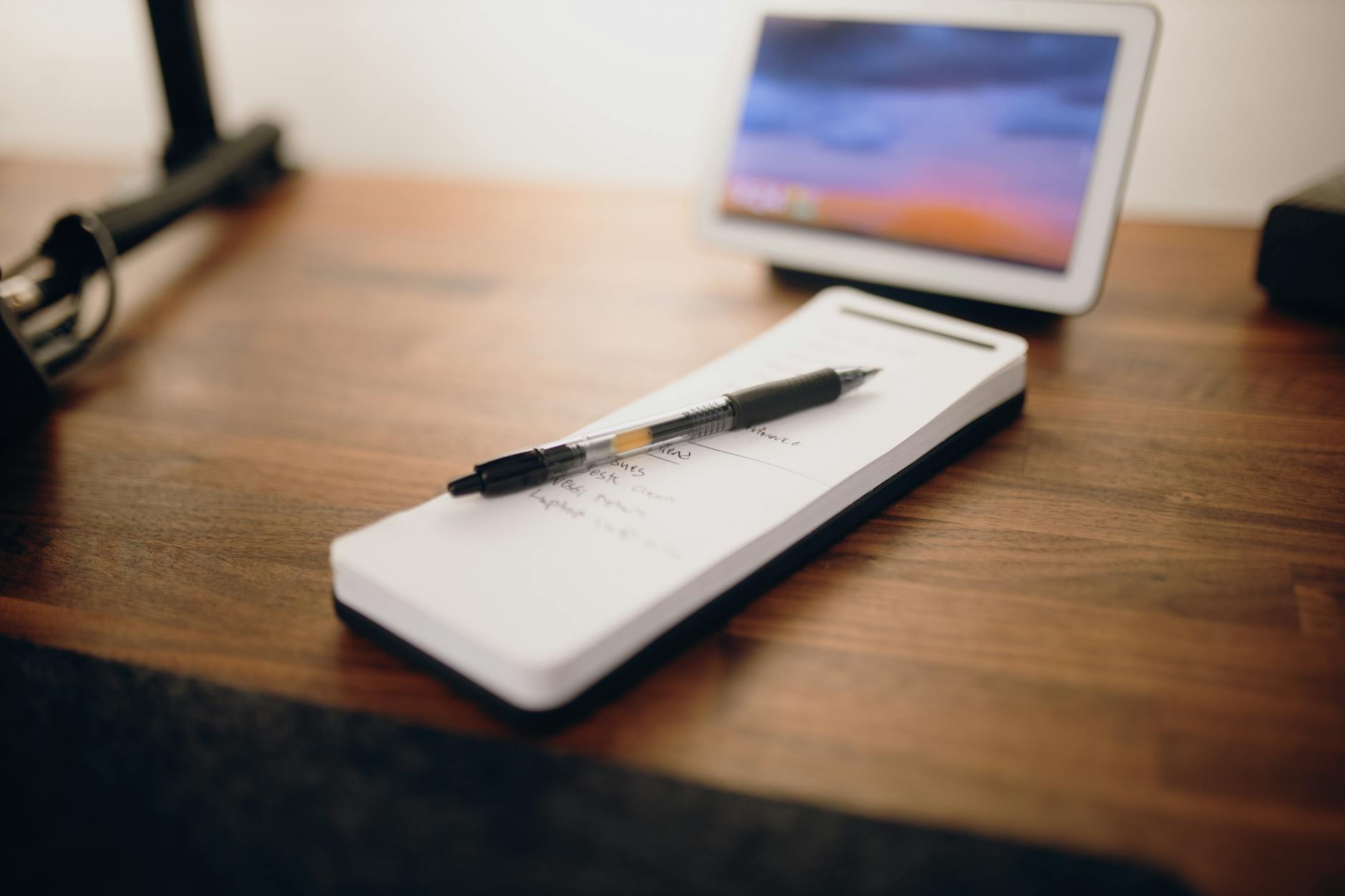 a black pen on white notepad, writing a guest post