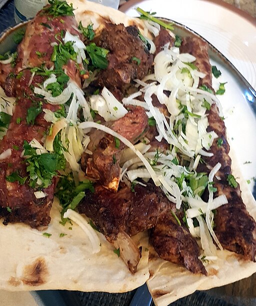 Armenian khorovats barbecue served on a platter in Gyumri