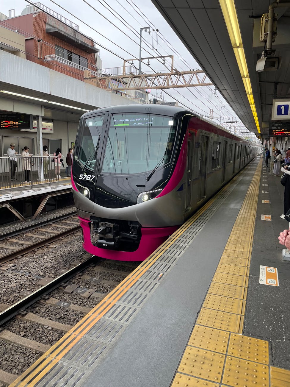 view of a train at a station in city
Tokyo by train