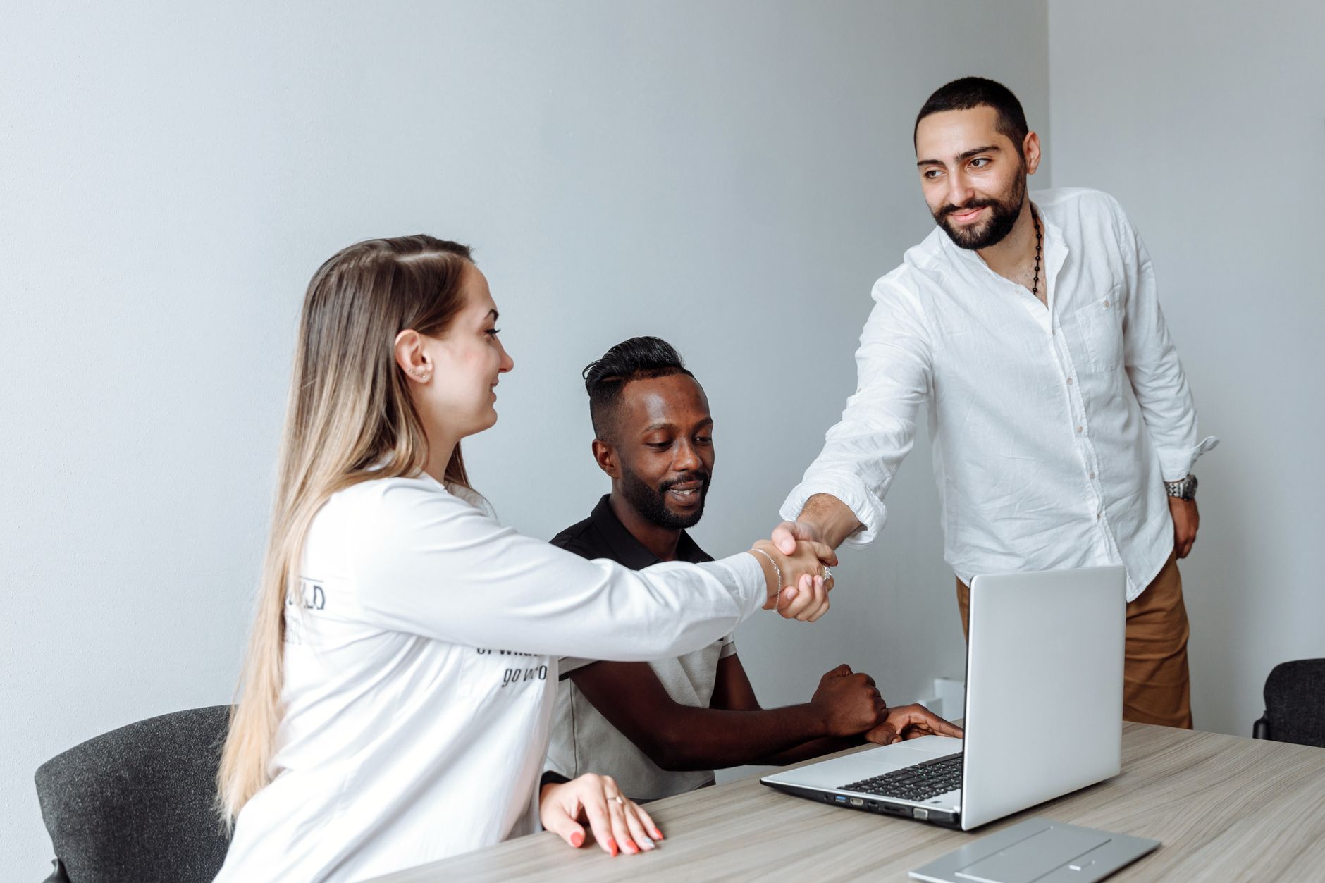a man and a woman shaking hands