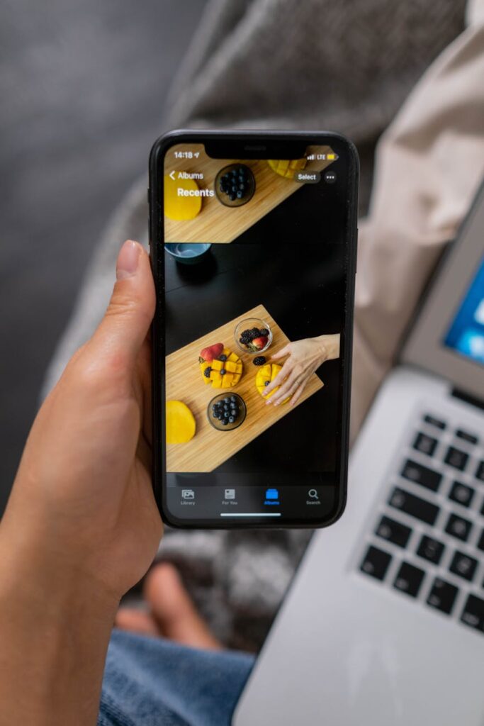 person holding black mobile phone