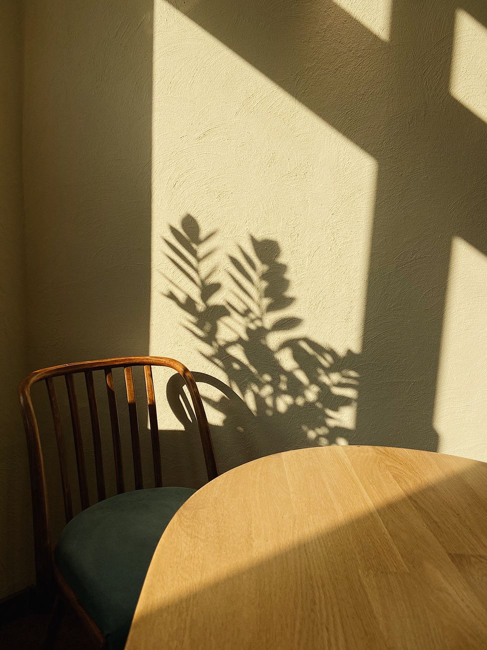chair in front of an empty table. early summer to monsoon transition still life