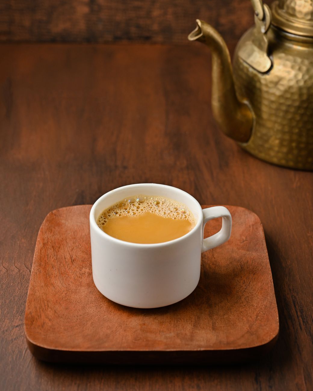 tea in cup. hot chai enjoyed during the first rain of July monsoon