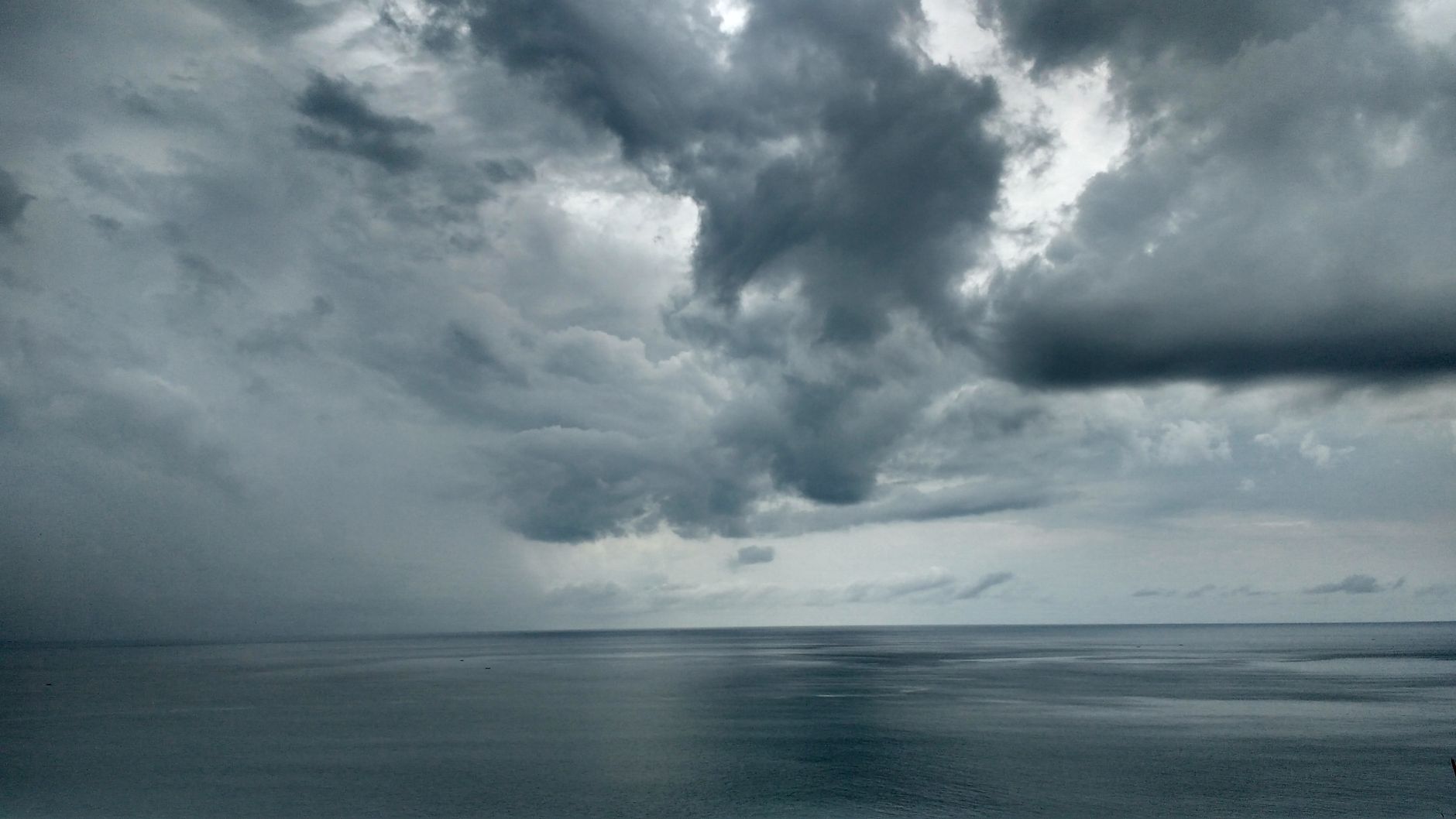 dramatic sky over sea.
early summer to monsoon transition sky
