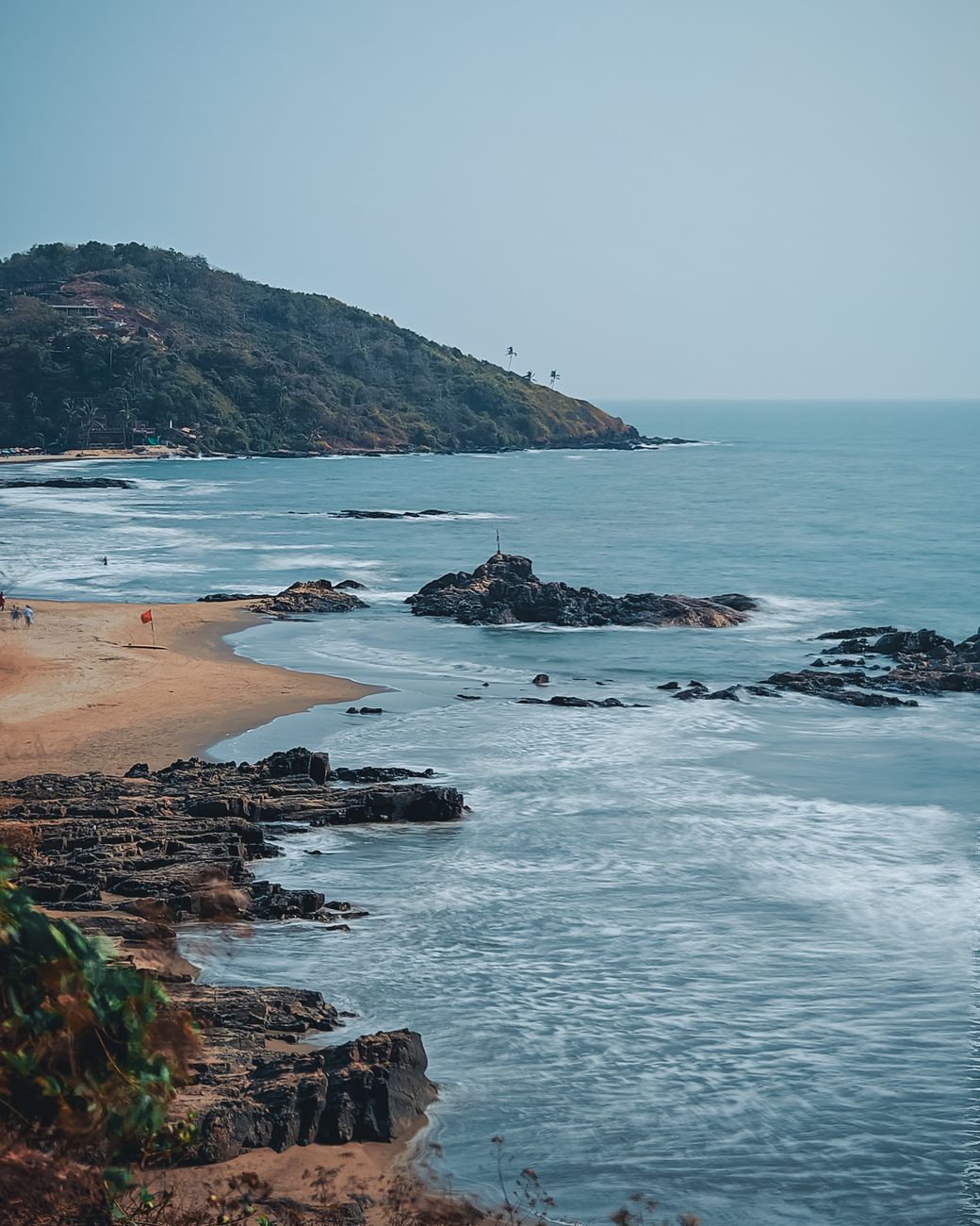 beach and hill on sea coast. Goa snorkeling el nino monsoon break india