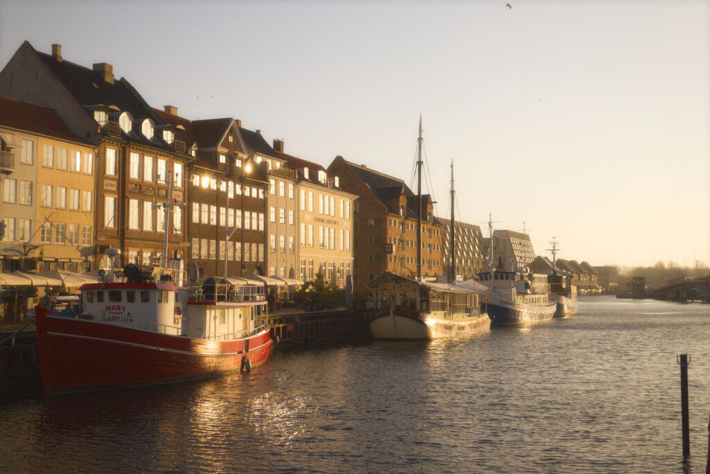 scenic nyhavn canal in copenhagen at sunrise