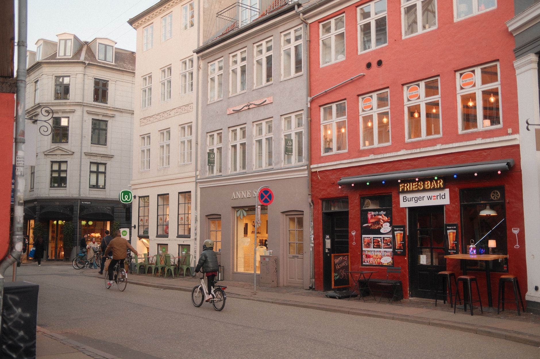 charming copenhagen street with colorful buildings. Quiet Copenhagen street with colorful buildings, soft northern light, and early‑autumn calm.