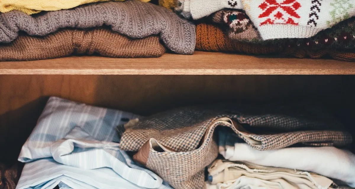 Cupboard full of woman's clothes