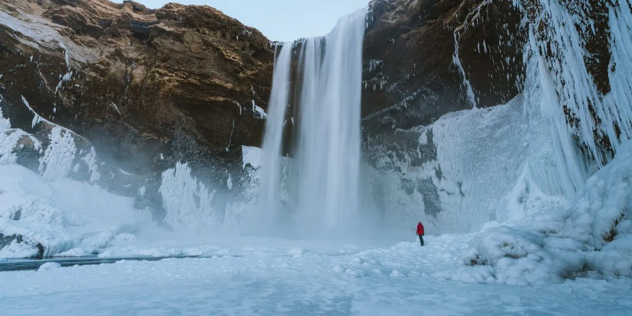 person walking on snowfield